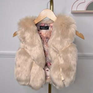 Fashionable girl faux fur and faux leather flesh pink vest